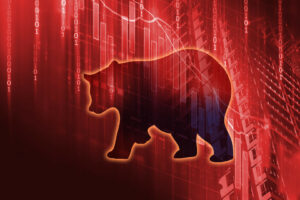 silhouette form of bear on financial stock market graph represent stock market crash or down trend investment